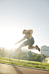 Image showing young athlete running