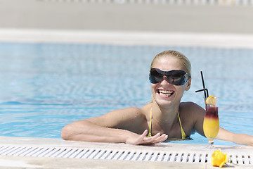 Image showing woman relax on swimming pool