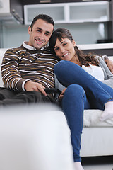 Image showing Relaxed young  couple watching tv at home