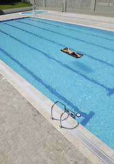 Image showing woman relax on swimming pool