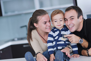 Image showing happy young family have fun  at home