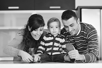 Image showing happy young family have fun  at home