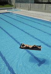 Image showing beautiful woman relax on swimming pool