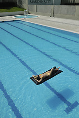 Image showing beautiful woman relax on swimming pool