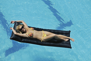 Image showing woman relax on swimming pool