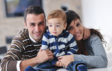 Image showing happy young family have fun  at home