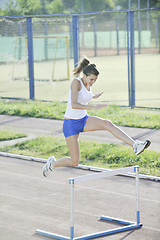 Image showing woman jogging at early morning