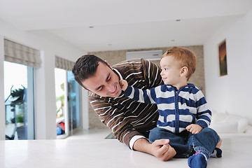 Image showing happy young family have fun  at home