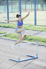 Image showing woman jogging at early morning