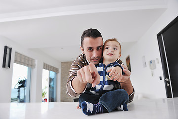 Image showing happy young family have fun  at home