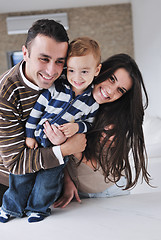 Image showing happy young family have fun  at home