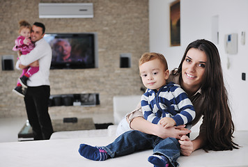 Image showing happy young family have fun  at home