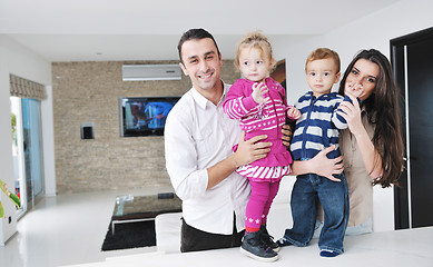 Image showing happy young family have fun  at home