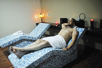 Image showing man relaxing at spa