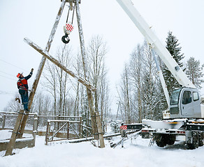 Image showing Repair power lines in winter