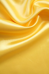 Image showing Smooth elegant golden silk can use as background 