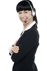Image showing Friendly female telephone operator at your service
