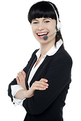 Image showing Customer support executive enjoying her work