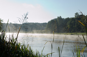 Image showing morning fog on river and mysterious house 