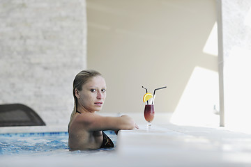 Image showing woman relax on swimming pool