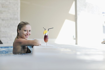 Image showing woman relax on swimming pool