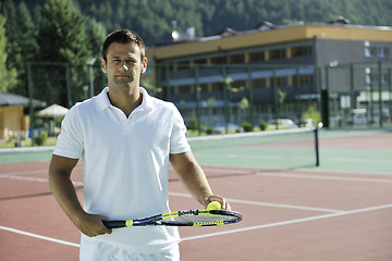 Image showing young man play tennis