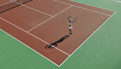 Image showing young woman play tennis outdoor
