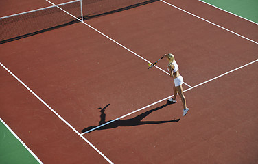 Image showing young woman play tennis outdoor