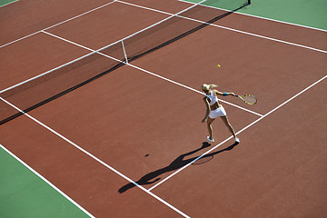 Image showing young woman play tennis outdoor