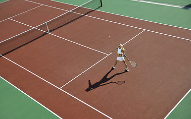 Image showing young woman play tennis outdoor