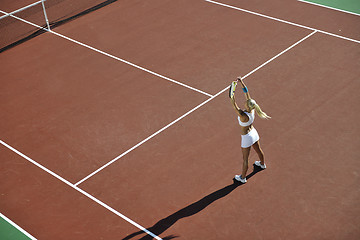 Image showing young woman play tennis outdoor