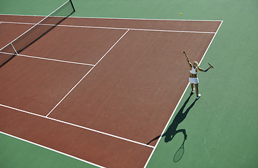 Image showing young woman play tennis outdoor