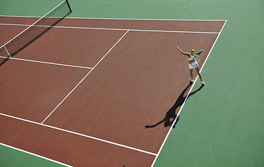 Image showing young woman play tennis outdoor