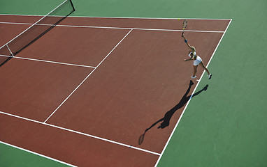 Image showing young woman play tennis outdoor