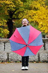 Image showing happy girl with umbrella