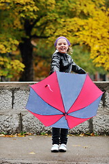 Image showing happy girl with umbrella