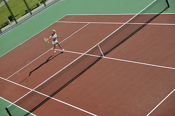 Image showing young woman play tennis outdoor