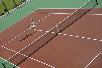 Image showing young woman play tennis outdoor