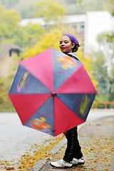 Image showing happy girl with umbrella