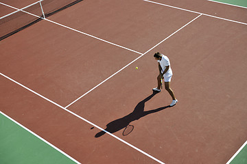 Image showing young man play tennis