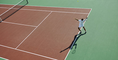 Image showing young man play tennis