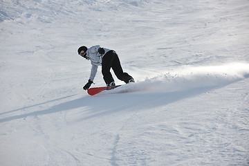 Image showing  skiing on on now at winter season