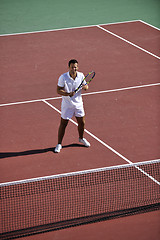 Image showing young man play tennis