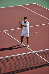 Image showing young man play tennis