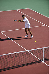 Image showing young man play tennis