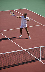 Image showing young man play tennis