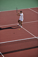 Image showing young man play tennis