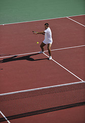 Image showing young man play tennis