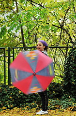 Image showing happy girl with umbrella