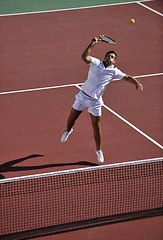 Image showing young man play tennis